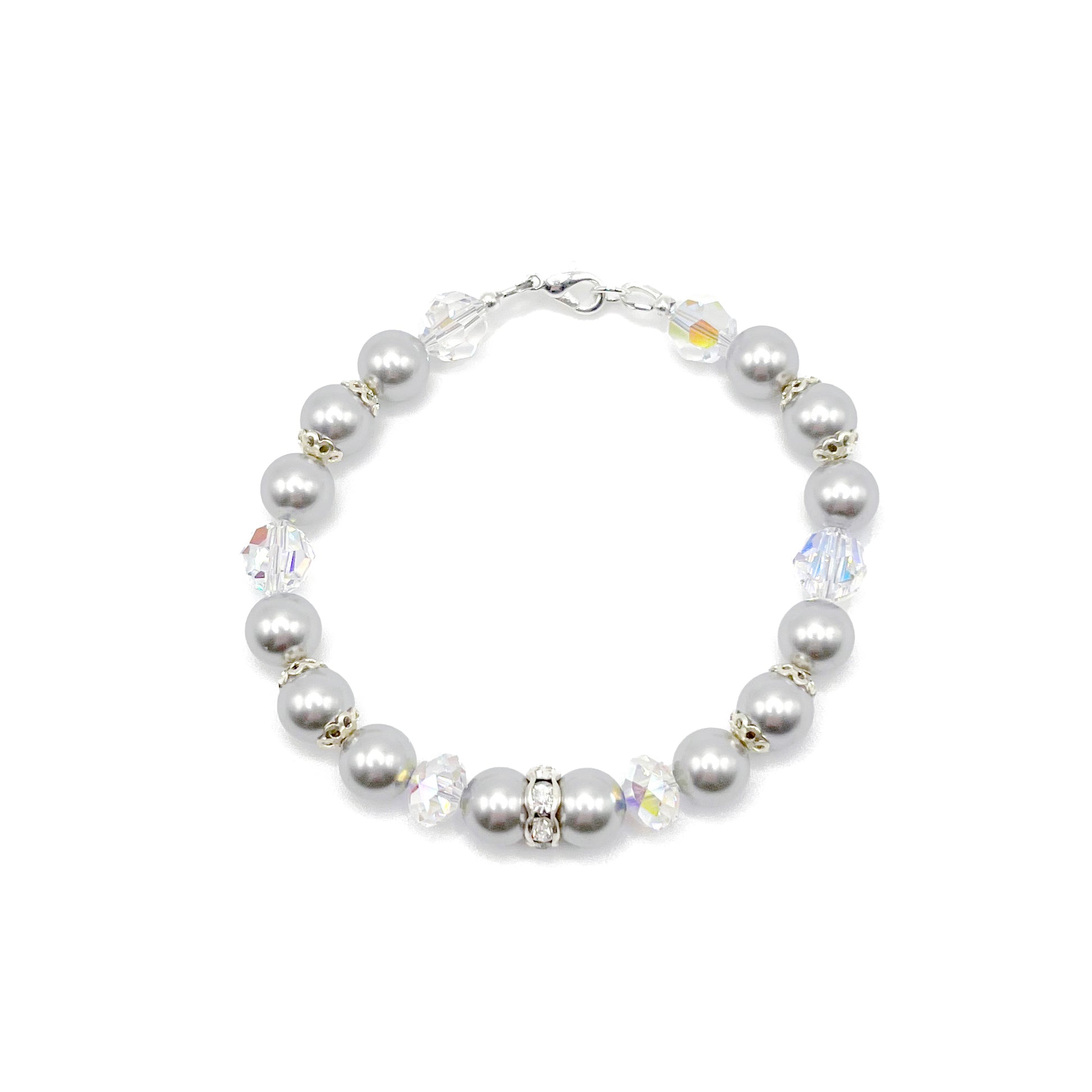 Light grey pearl bracelet with sterling silver accents, handcrafted with refined simplicity.