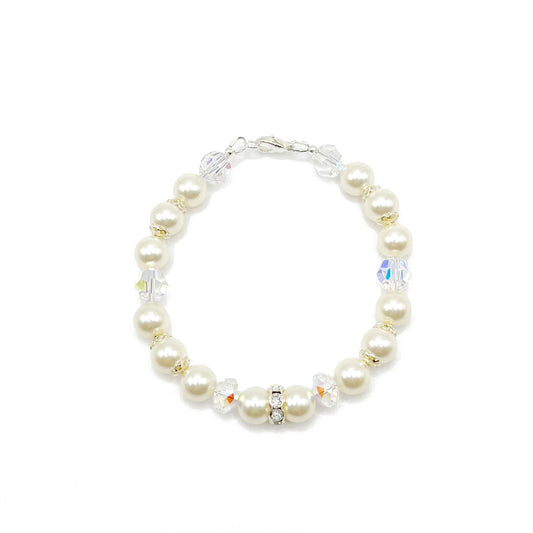 Cream-toned crystal pearl bracelet with sterling silver accents, classic and warm in tone.