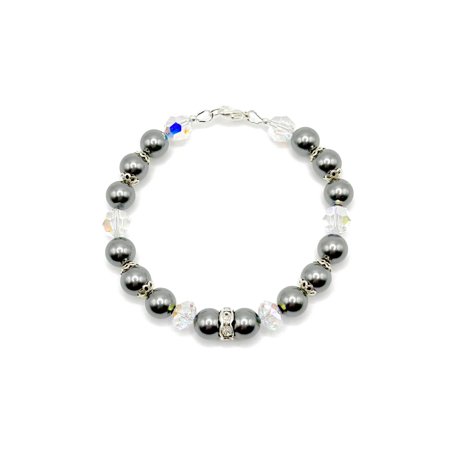 Dark gray pearl bracelet with sterling silver accents, hand-strung and sophisticated in style.