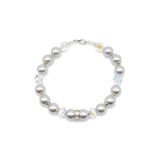 Light grey pearl bracelet with sterling silver accents, handcrafted with refined simplicity.