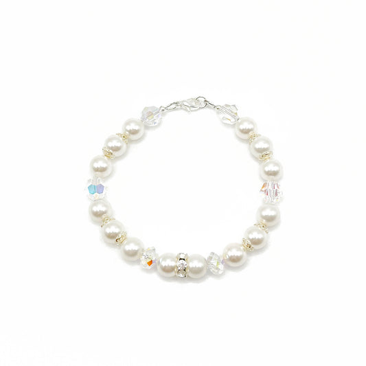 White crystal pearl bracelet with sterling silver accents, hand-strung for elegant bridal style.